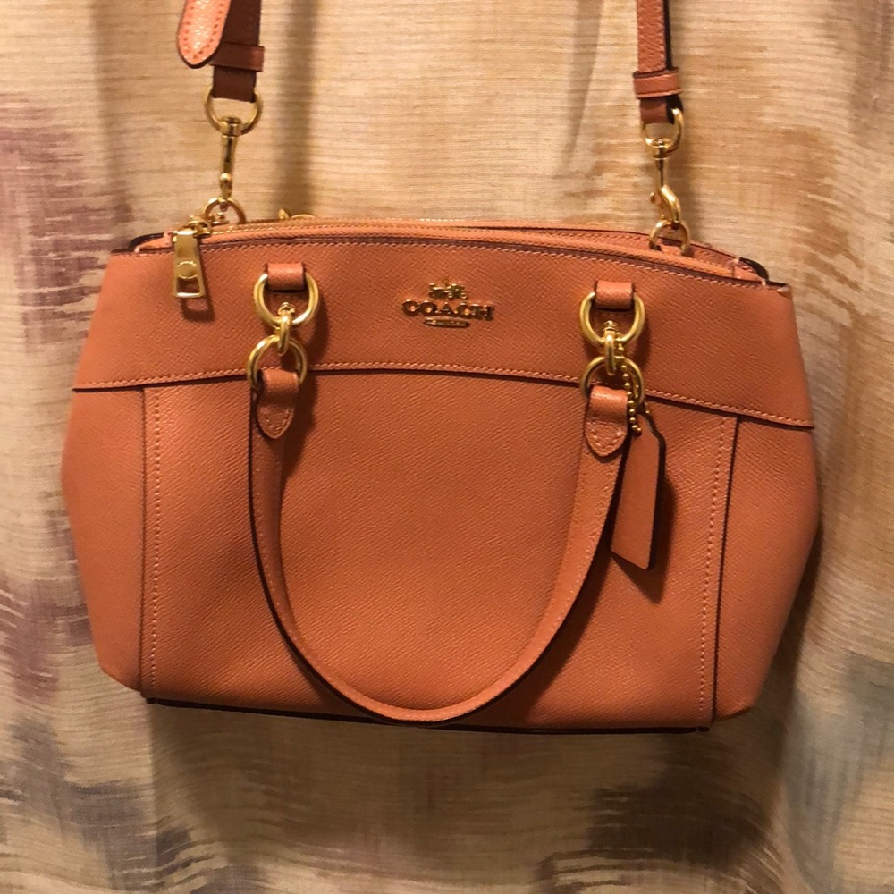 Coach mini crossbody; Vintage Pink color, New